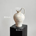 vase poterie moderne gris beige fleur séchée décoration intérieure texture marbrée lisse rustique arrangement