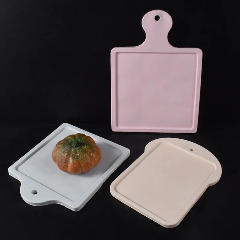 plateau découpant silicone forme pain grillé rose blanc moderne minimaliste alvéolaire transparent accrochage fruits