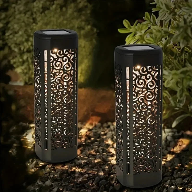 Lampes solaires jardin noires ajourées motifs floraux éclairage extérieur ambiente
