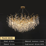 Suspension lumineuse contemporaine transparente dorée branches feuilles LED 100cm