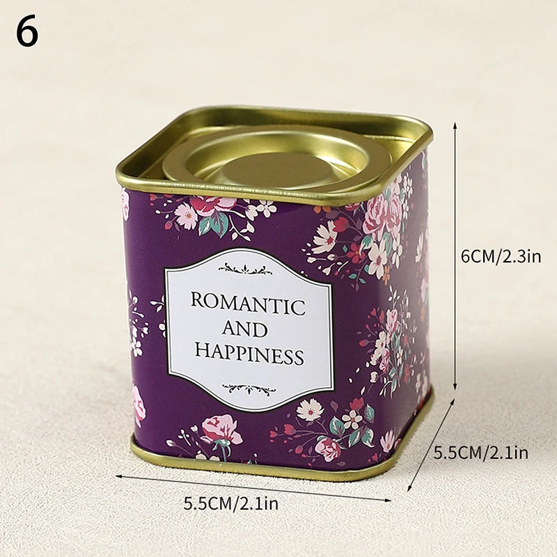 boîtes métal bleu rose noir fleurs vintage capsules étiquettes messages conservation snacks thé