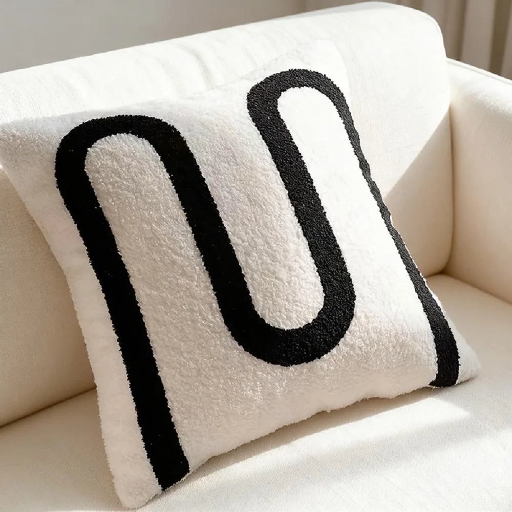 housse coussin décorative polyester coton blanc noir motif carreaux contemporain respectueux environnement maison hospitalière