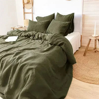 Housse de couette en lin français lavé à la pierre sur un lit