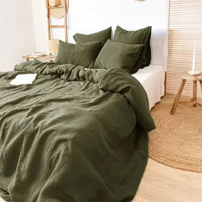 Housse de couette en lin français lavé à la pierre sur un lit