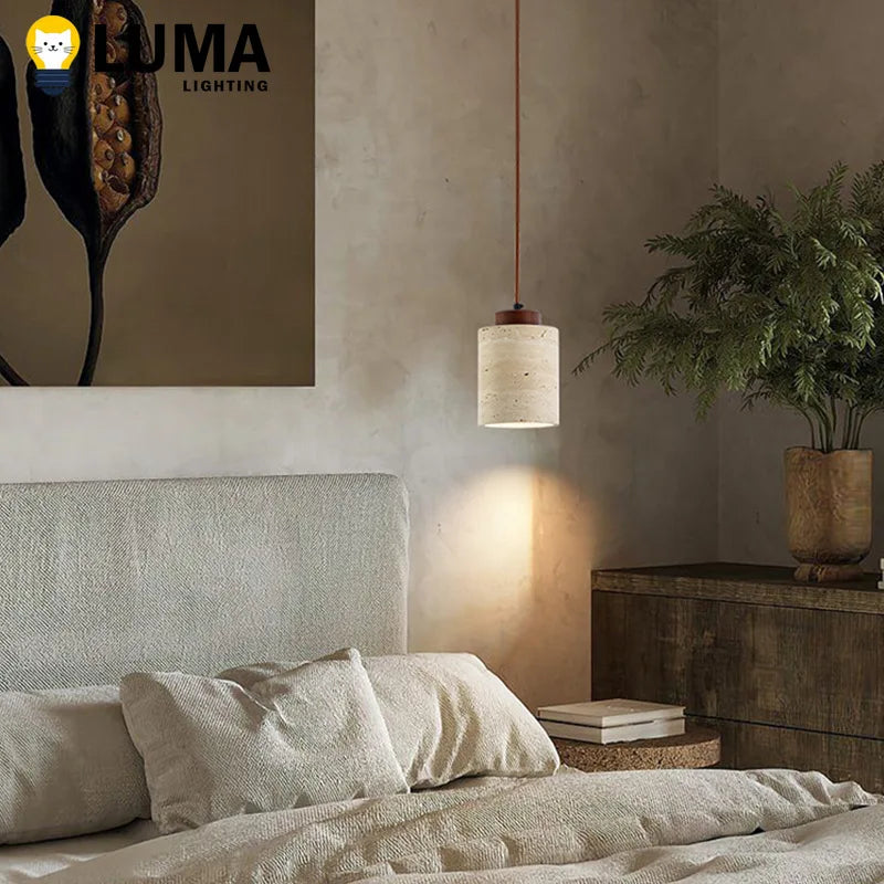 Suspension lumineuse pierre beige clair texture granulée moderne câble noir chambre salon