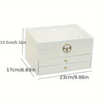 boîte rangement bijoux cuir blanc moderne élégante poignées métalliques verrouillable intérieure motifs géométriques