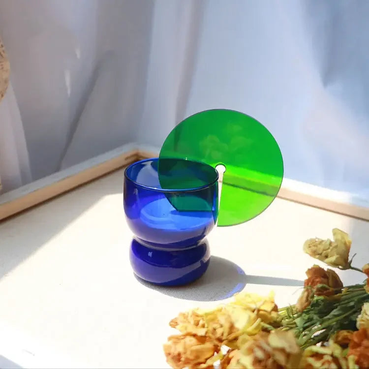support verre moderne acrylique tapis rond texturé boule verre bleu vert orange jaune rouge