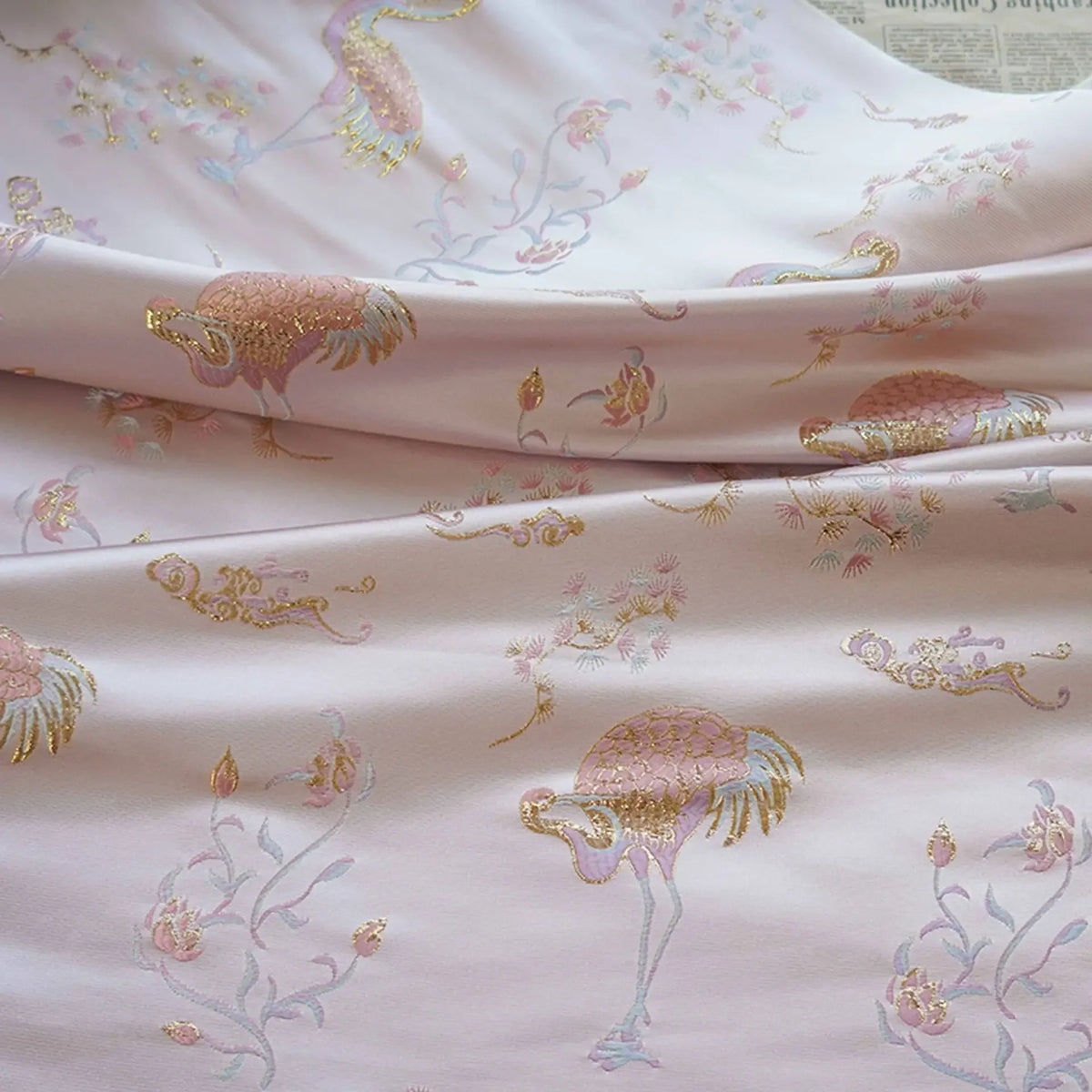 tissu brodé rose clair oiseaux fleurs traditionnel polyester largeur 145cm opacité Jacquard