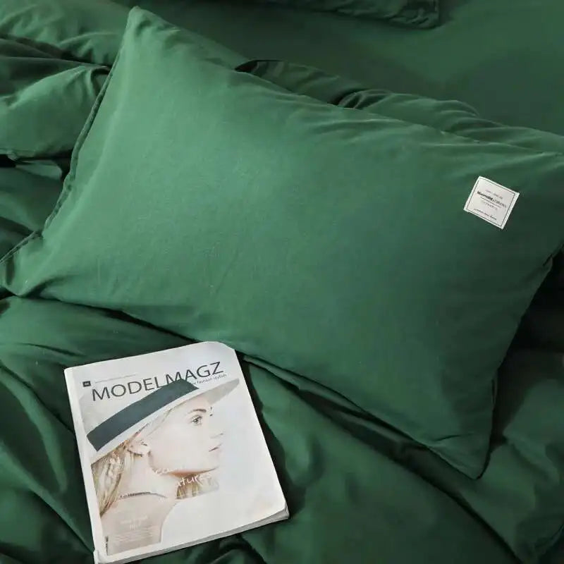 Taies d'oreiller vert foncé assorties à la housse de couette