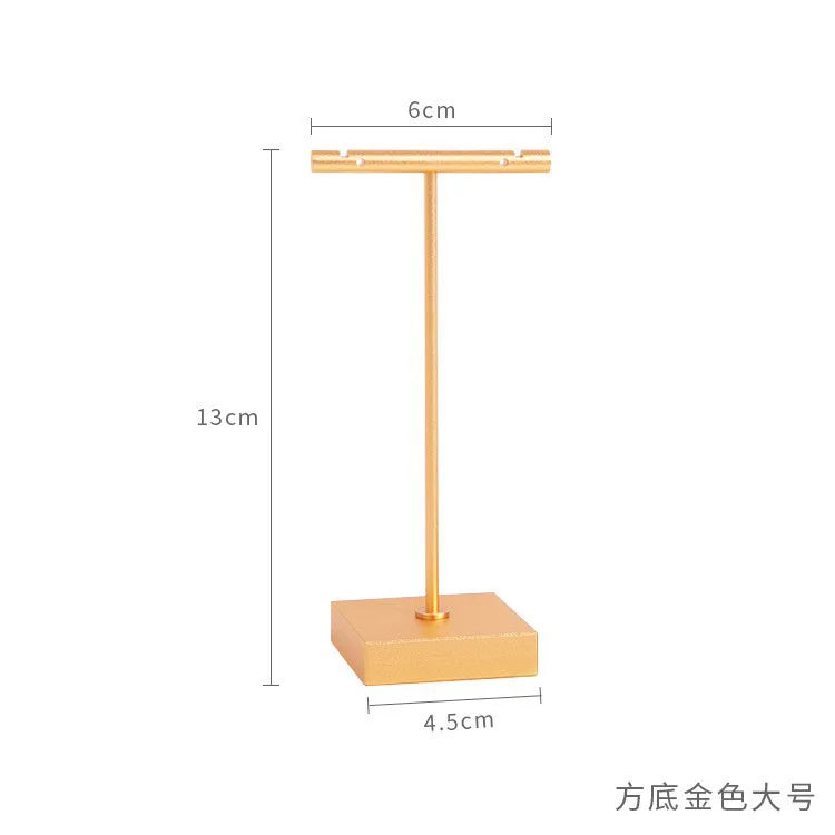 présentoir bijoux métal or mat texture brossée moderne élégant base conique supports différents tailles