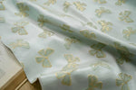 tissu polyester rose clair papillons doré noir moderne élégant coudre bricolage respectueux environnement Jacquard