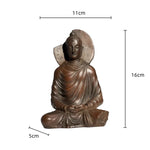 statue bouddha traditionnelle lisse brun foncé décoration maison religieuse ornement