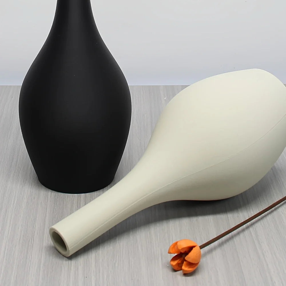 vase minimaliste moderne fleurs séchées noir blanc marron surface mate