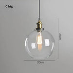 suspension lumineuse industrielle vintage ampoule filament verre transparent noir salon restaurant bar