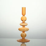 bougeoir verre moderne orange vert jaune rayures bordure ondulée transparent élégant décoration maison chandelle