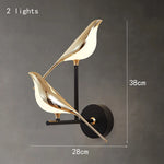 lampe murale oiseau stylisé or noir moderne chambre salon decoration aluminium led fixation murale
