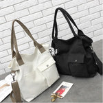 sac bandoulière toile unisexe polyester doux solide blanc noir poche avant cross body