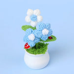 bouquet artificiel fleurs feuilles couleurs variées blanc rouge orange violet vert intérieur décoration festive