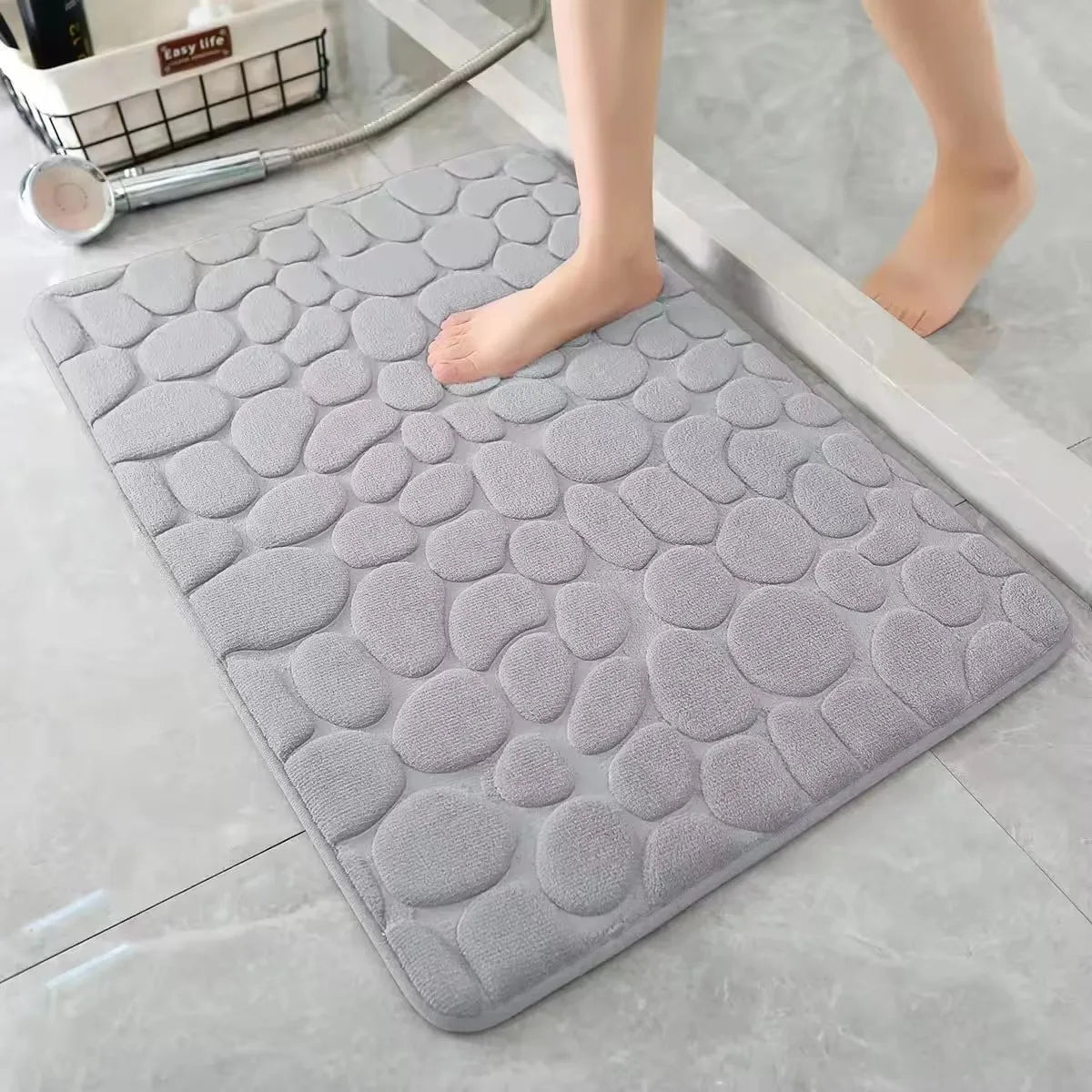 tapis bain gris moderne texture cailloux absorption eau antidérapant polyester pvc machine wash oblong