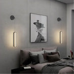 Détail de l'applique murale LED avec abat-jour blanc