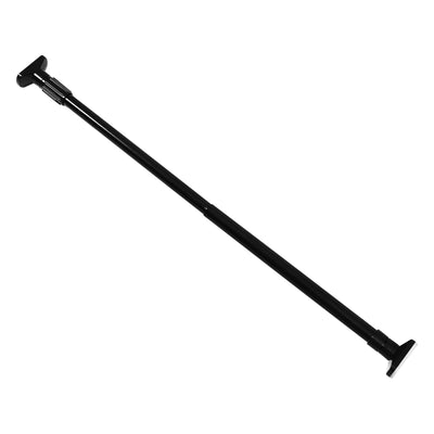 Tringle extensible rideau télescopique noir installée dans une salle de bain moderne