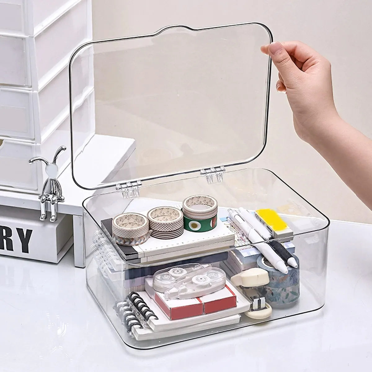 boîte rangement transparente moderne poignées stylos épingles rubans adhésifs clous carnet organisateur minimaliste
