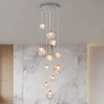 Suspension lumineuse moderne dorée noir formes géométriques brillantes salon chambre