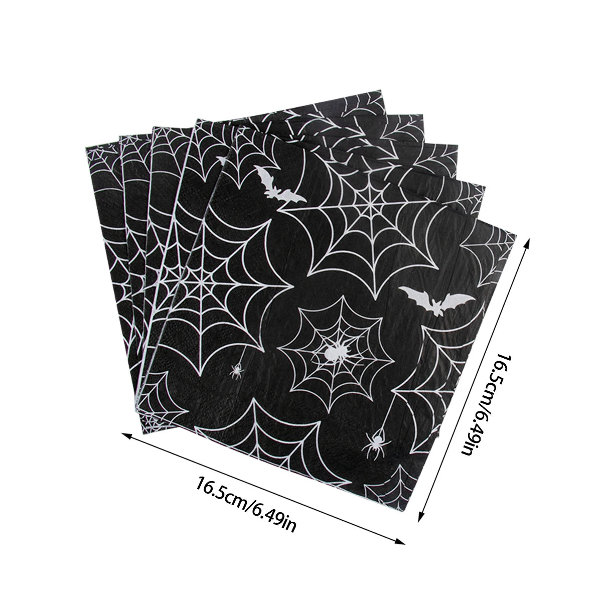assiettes halloween araignées verres serviettes table noire blanc points brillants toile festive octobre