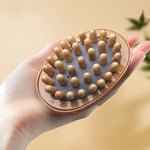 brosse massage relaxation corps bille bois surface rugueuse ceinture élastique marron gris praticité moderne