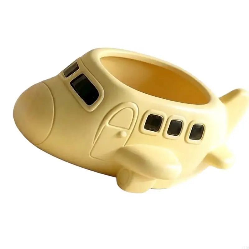 pots decoratifs forme avion appareil photo couleur jaune pâle surface lisse aspect mat decoratif