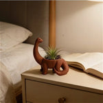 pot plantes forme dinosaure brachiosaure brun terracotta surface lisse aspect mat décoratif ludique menthe