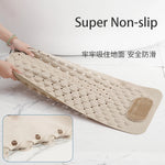 Tapis de bain gris foncé avec effet massage des pieds