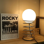 lampe table moderne sphérique spirale métallique blanc chrome
