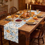nappe automnale citrouilles feuilles mortes rustique motif peint main blanc orange bleu marron festive