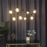 suspension lumineuse moderne scandinave noir sphères translucides ampoules led branchettes structure métallique