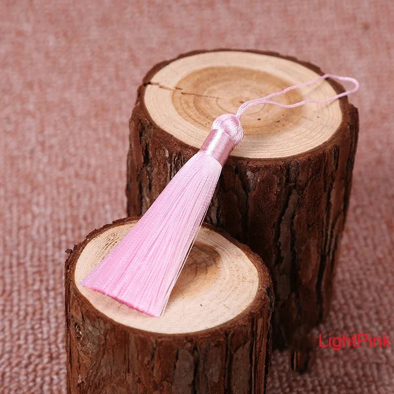 pompons polyester couleur variée 5cm longueur 18cm décoration artisanale rideaux couture pièces