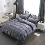 ensemble literie moderne noir blanc motif géométrique housse couette oreillers polyester
