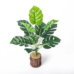 plantes artificielles monstera vert feuilles larges modernes decoration exterieure tronc bois pot ceramique