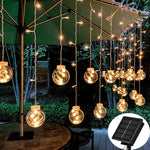guirlande lumineuse solaire transparente boules dorées clips modernes décoration extérieure noël jardin festive