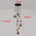 Suspension lumineuse moderne dorée noir formes géométriques brillantes salon chambre