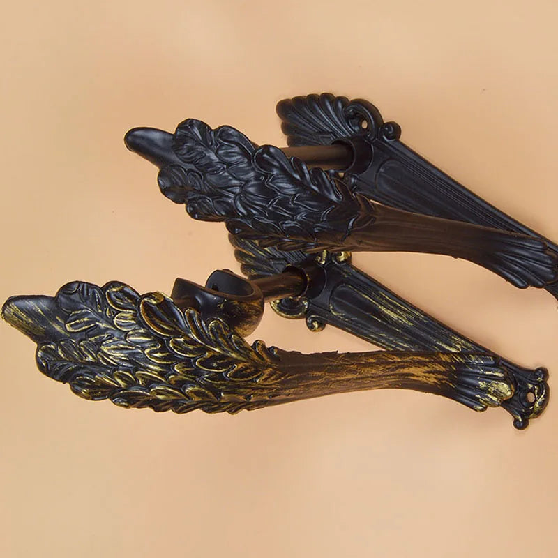tige rideau classique dorée ornée motifs floraux noir eyelets double simple