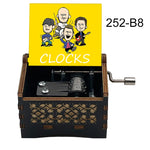 boîte musicale bois naturel motifs floraux 18 tons vintage manivelle horlogerie artisanale
