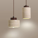 lampe suspendue moderne pierre texture granuleuse beige clair marron foncé éclairage salon chambre led