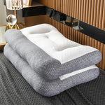 oreiller cervical ergonomique gris blanc texture tissée moderne contour arrondi fixations