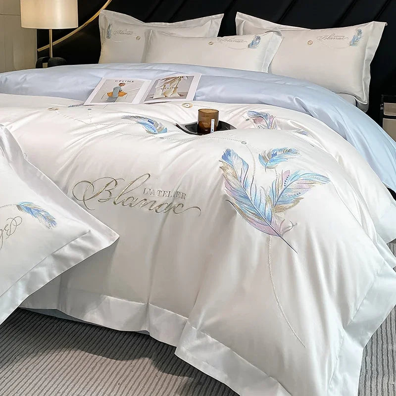 ensemble literie brodé plumes colorées blanc rose clair coton sergé taille king queen full