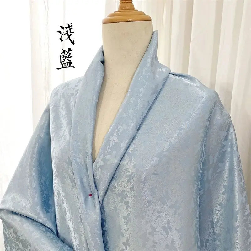 tissu jacquard fleurs blanches vert bleu clair rose pâle kimono traditionnel opaque polyester élasthanne
