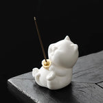 statuette chat vert clair céramique artisanale salon décoration incense apaisante moderne