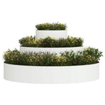 Cache-pot blanc avec plantes vertes sur terrasse