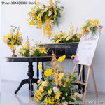 décoration mariage roses jaunes orchidées feuilles verte romantique élégant extérieur artificiel