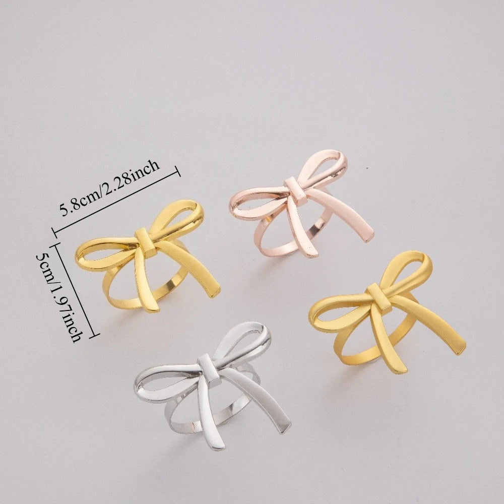 porte serviettes forme noeud papillon or argent rose doré texturé élégants festifs set six